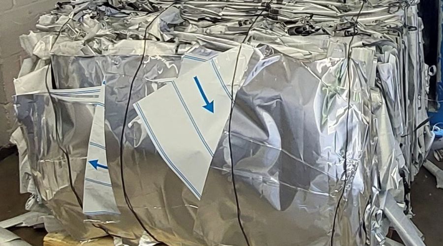 Recyclapak Alumium bails out of compactor small bail